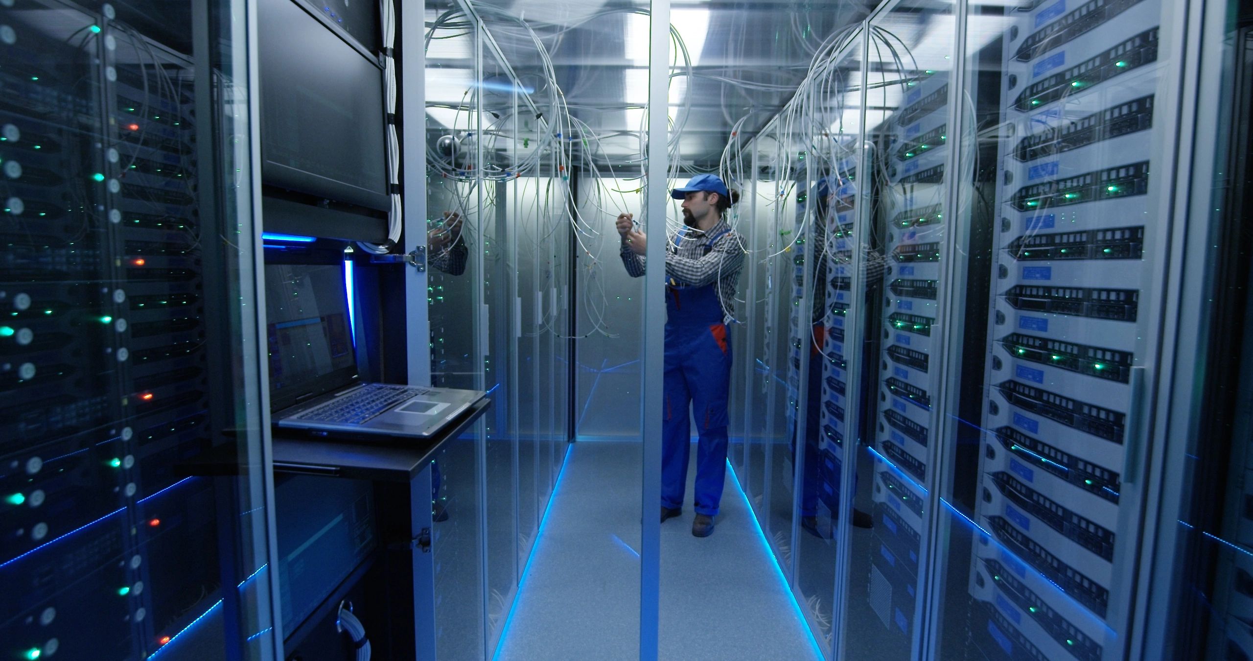 Technician working in a data centre