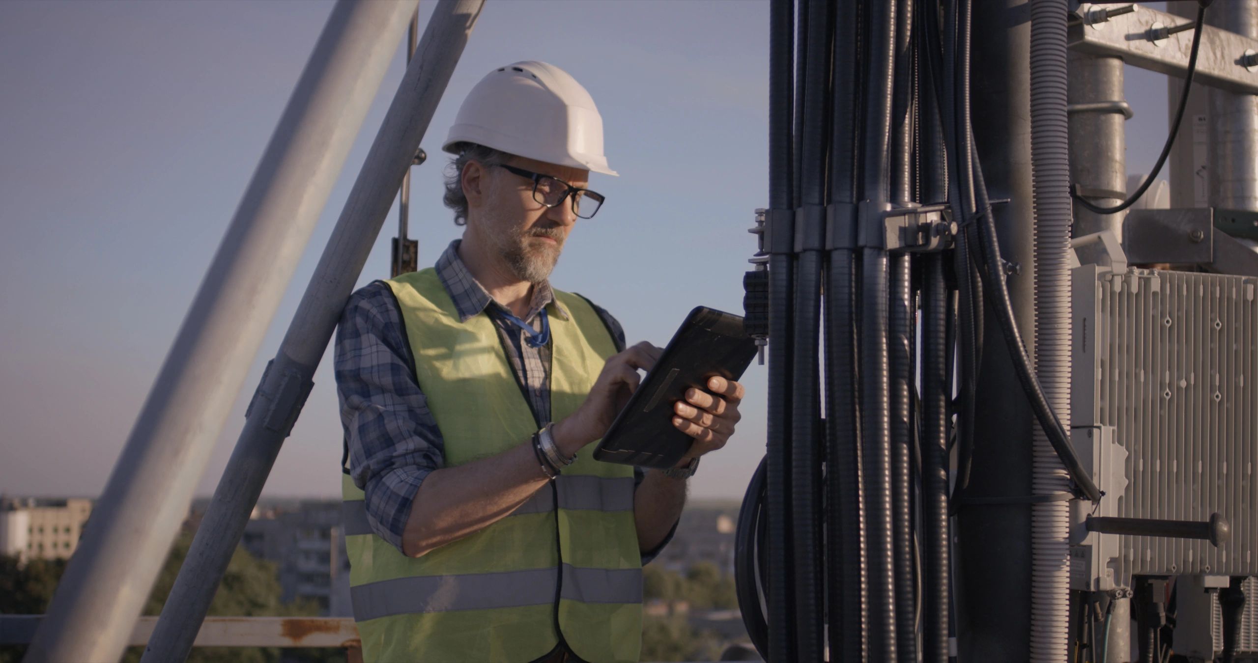 Telecom engineer commissioning antenna equipment