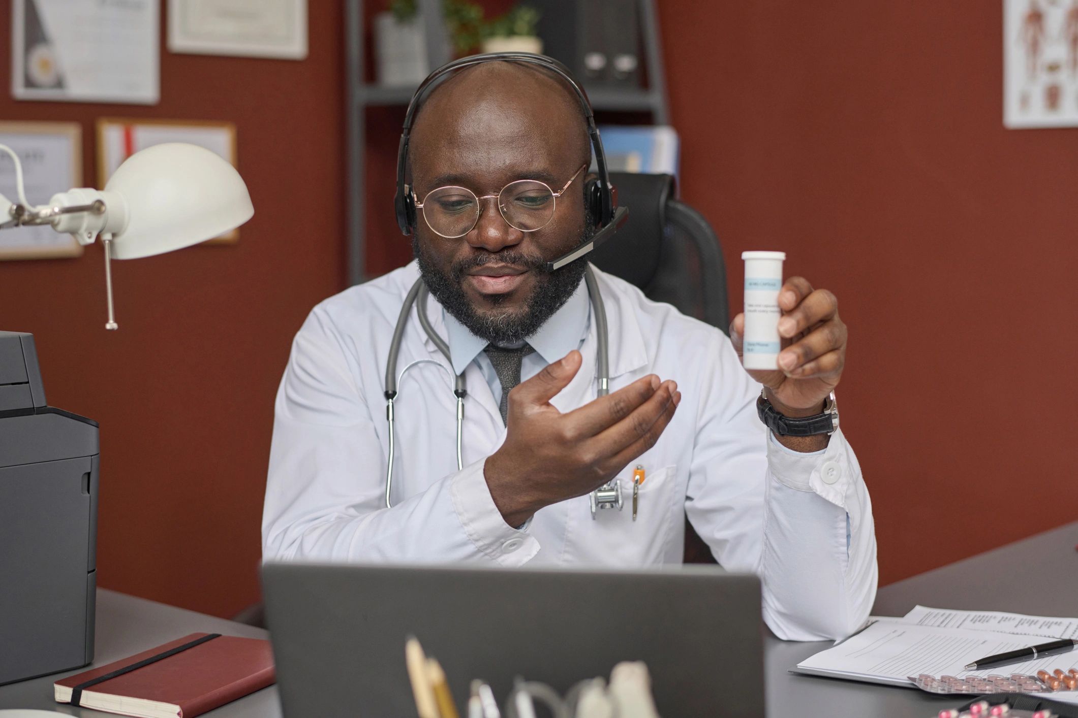 Caribbean doctor conducting a telemedicine consultation