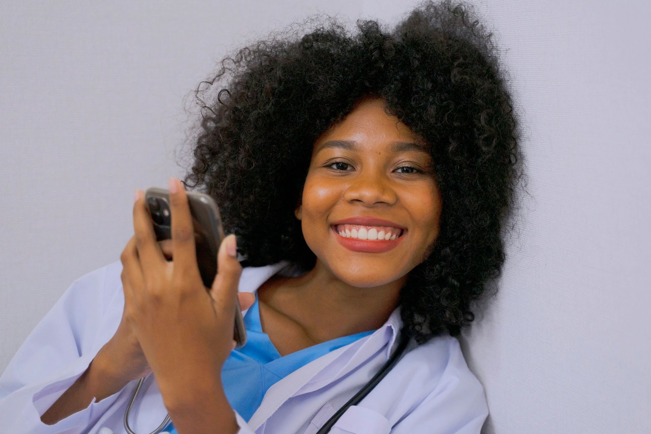Caribbean doctor preparing telemedicine technology in a hospital