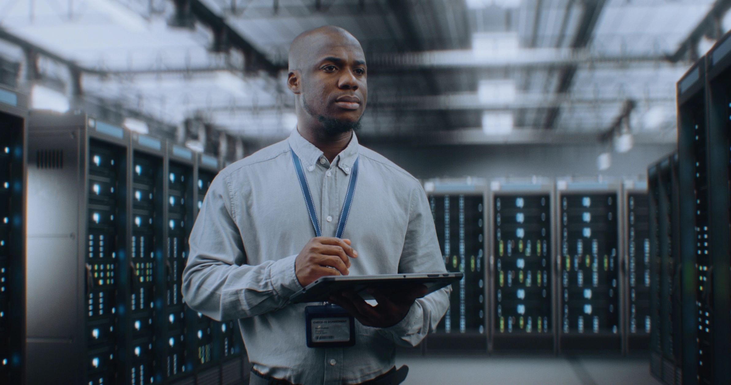 Network engineer working in a server room